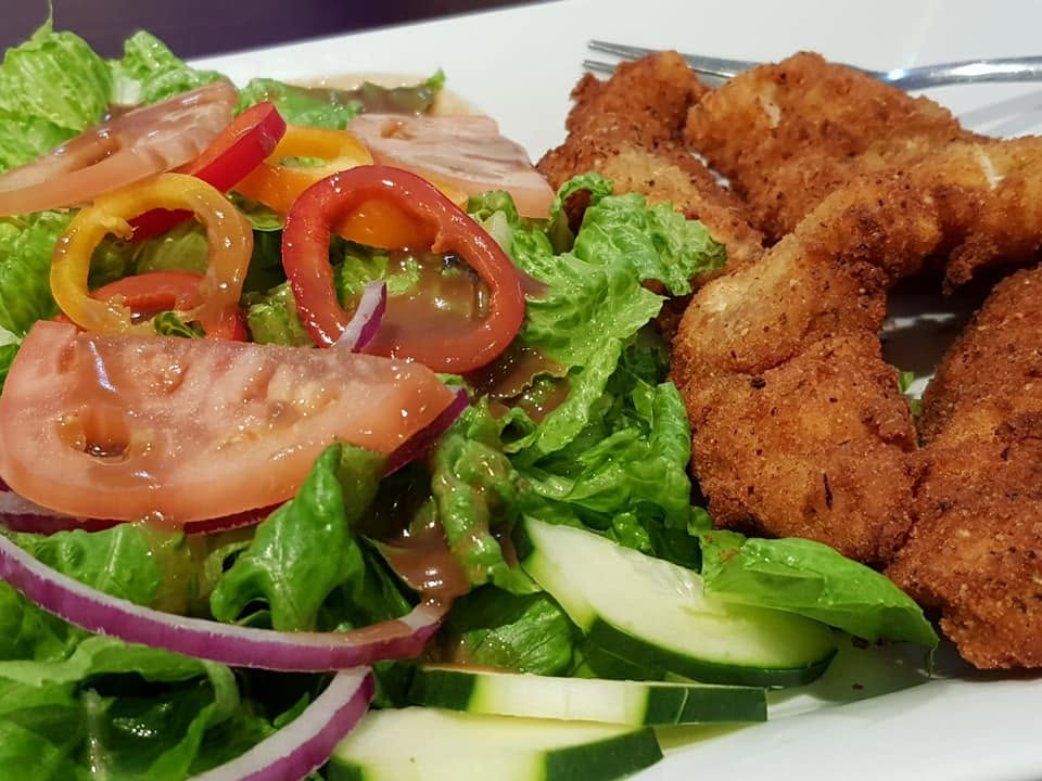 Crispy chicken with fresh garden salad from Bits and Bytes Cafe